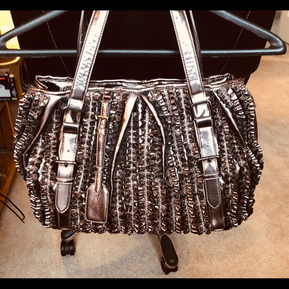 Woman’s pouch style handbag by Galian, New York